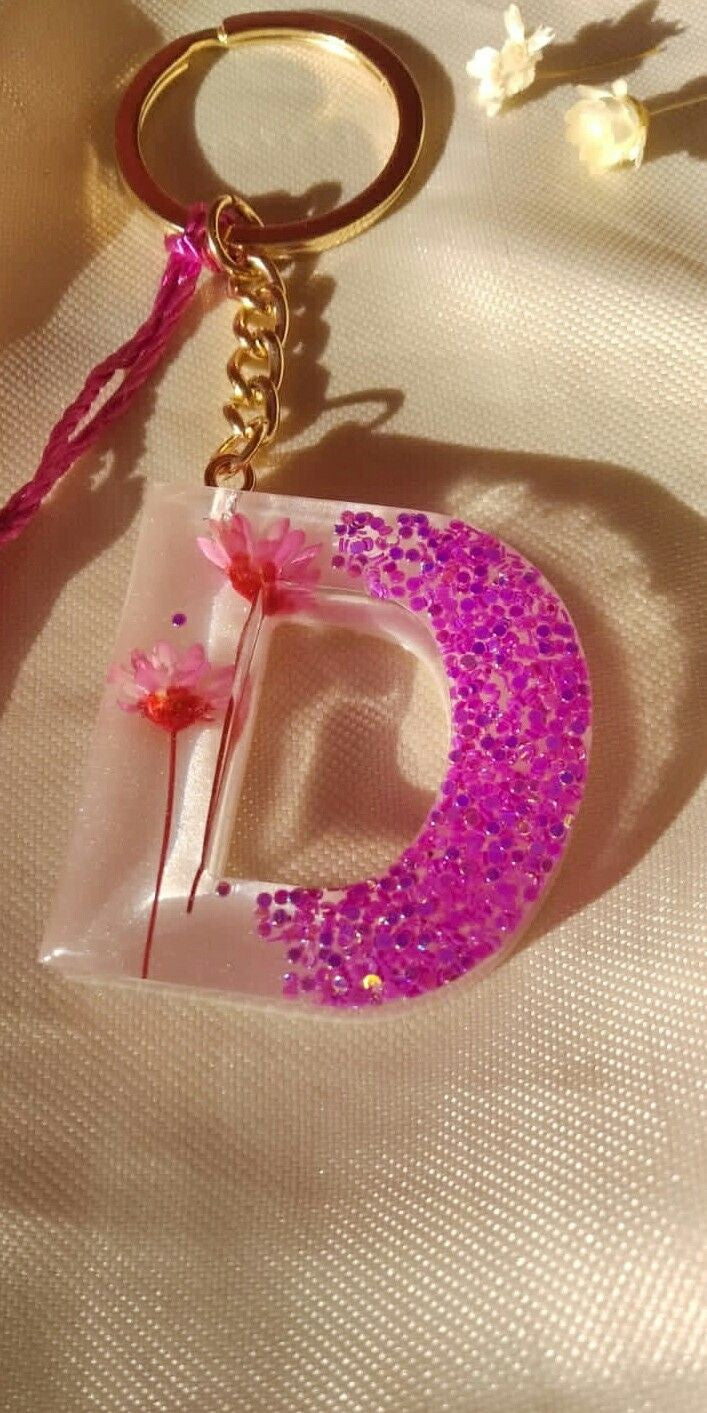 Flower added Pink Coloured Alphabet Keyring